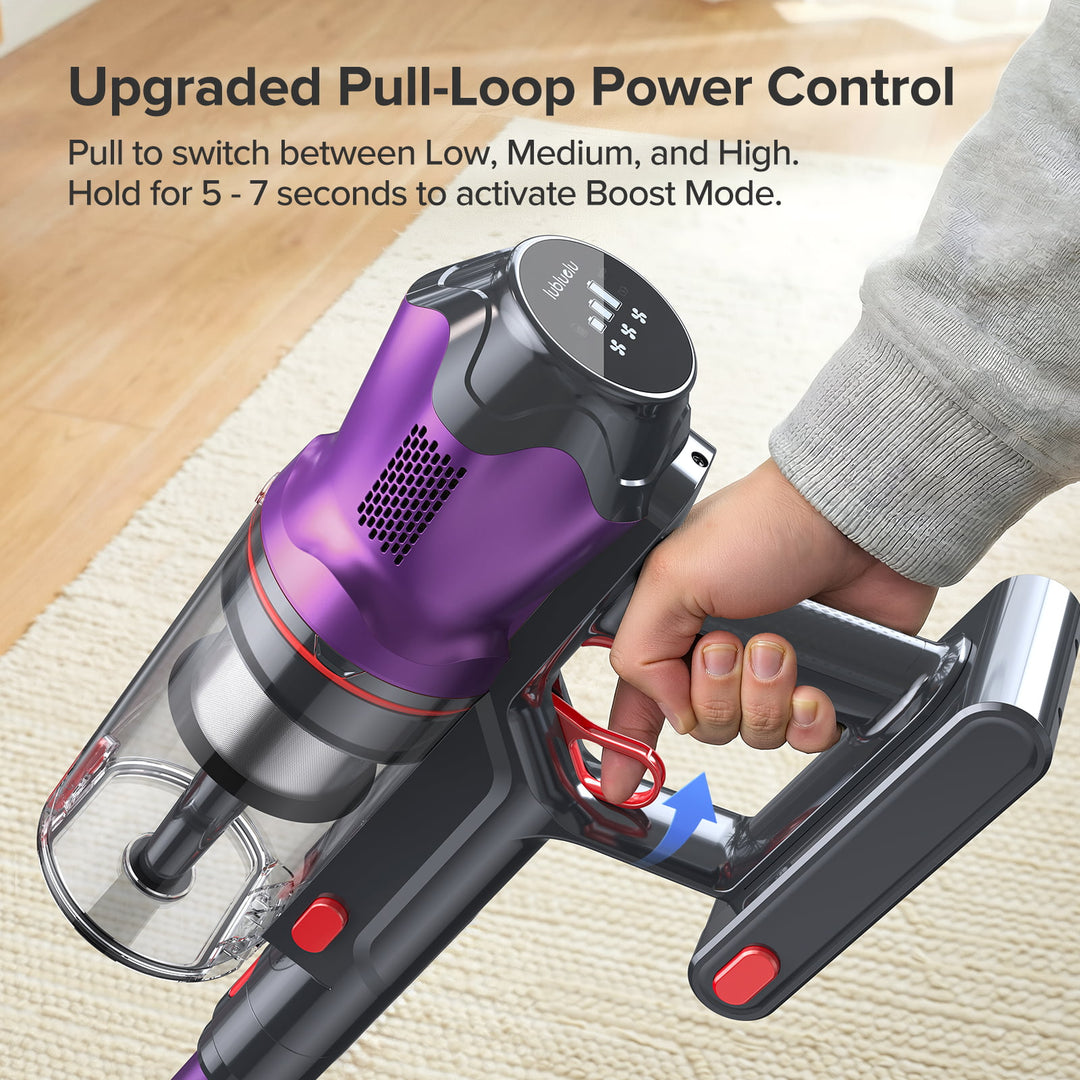 Hand holding a purple and black handheld vacuum cleaner with text on upgraded pull-loop power control.
